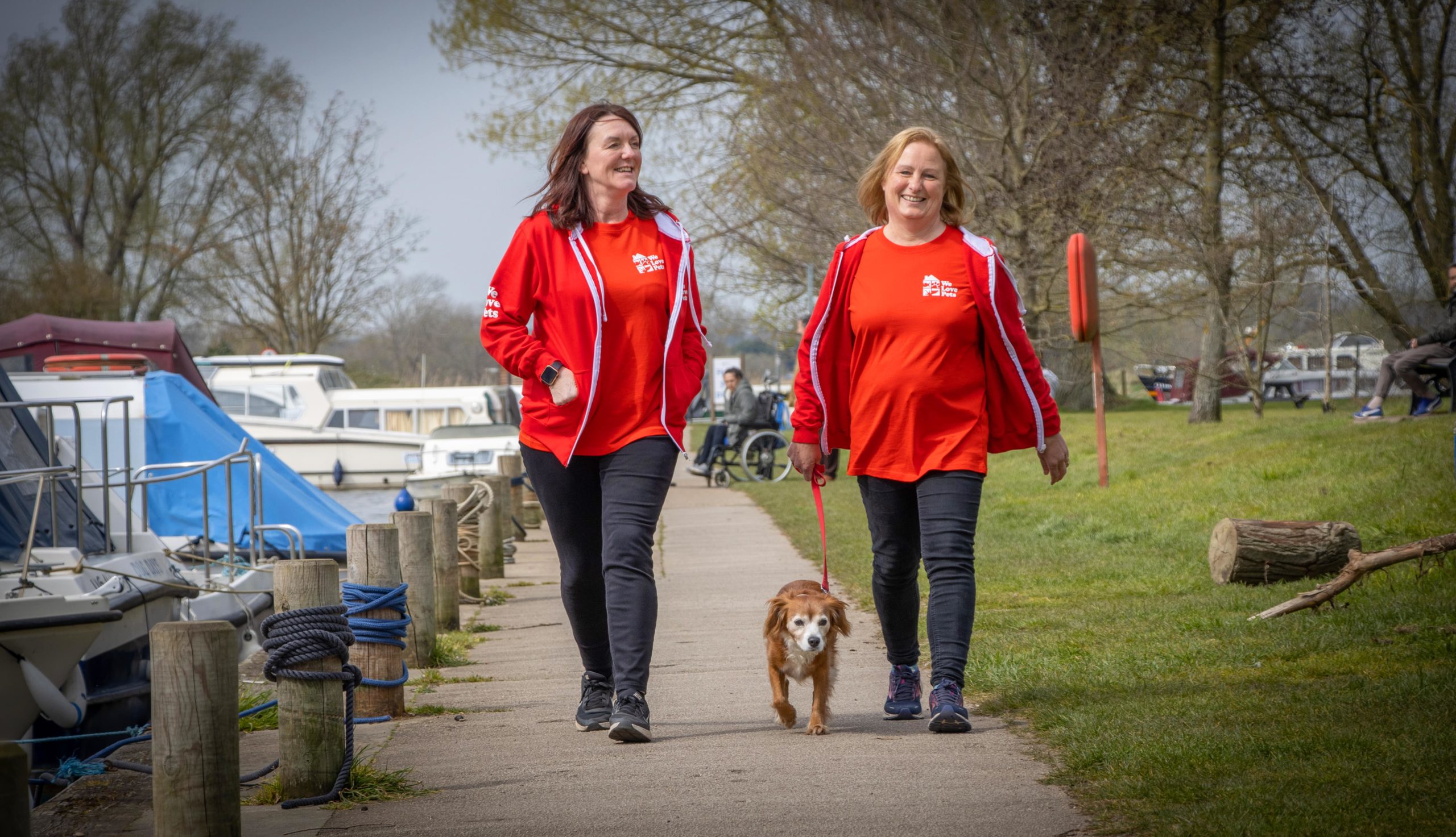Ruth and Rachael from We Love Pets Woodbridge and Ipswich walking dog on lead